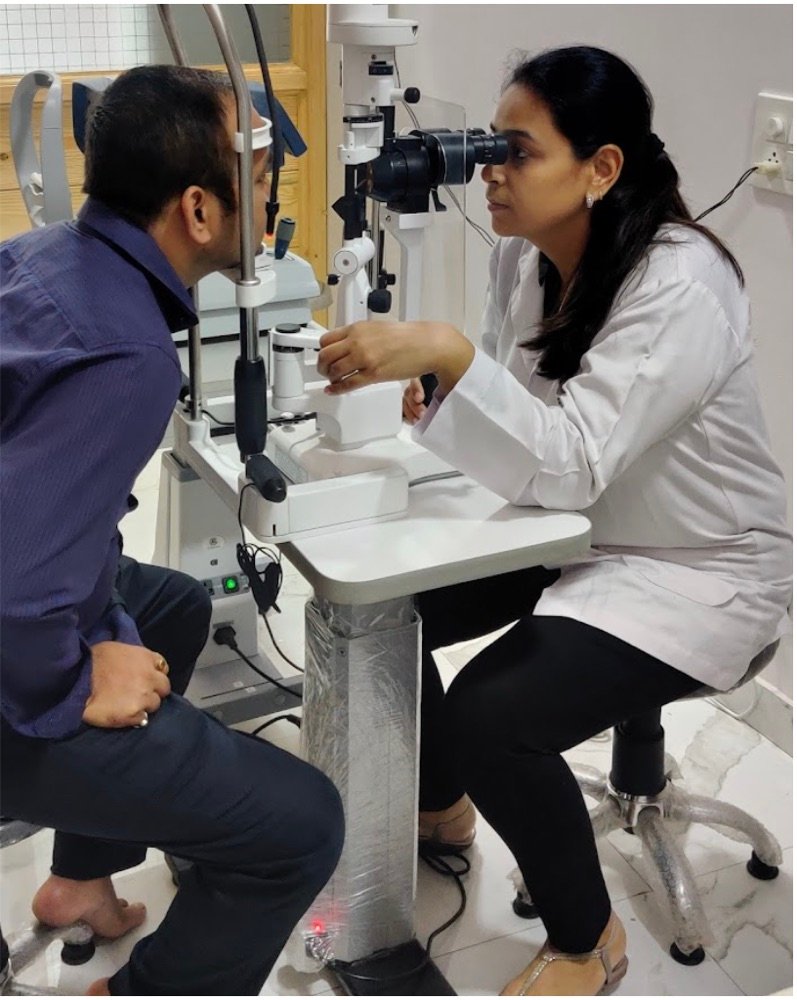 Dr. Somya Ish examining a patient at the slit lamp